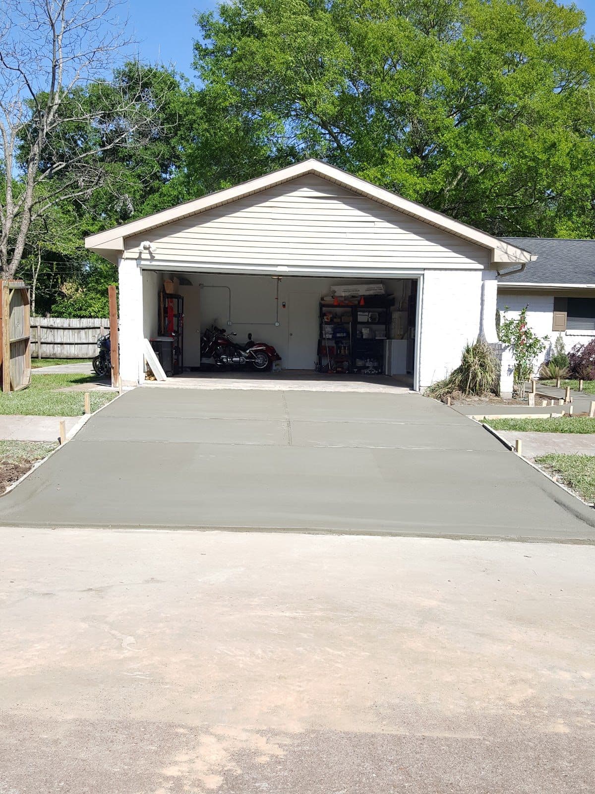 Freshly repaired concrete driveway in Houston, Texas