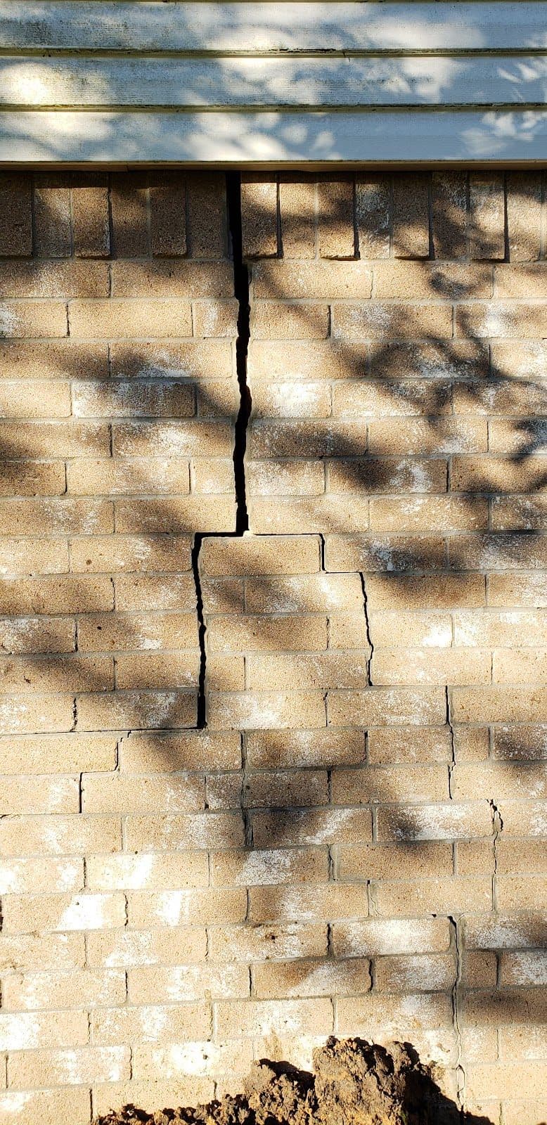 Before: cracks and gaps from settling